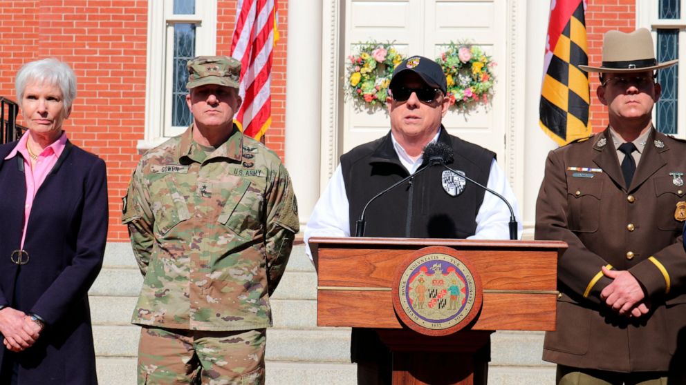 Maryland Gov. Larry Hogan announces an order to close bars, restaurants, gyms and move theaters in the state in response to coronavirus during a news conference at the governor's mansion on Monday, March 16, 2020 in Annapolis, Md. From left is Deputy