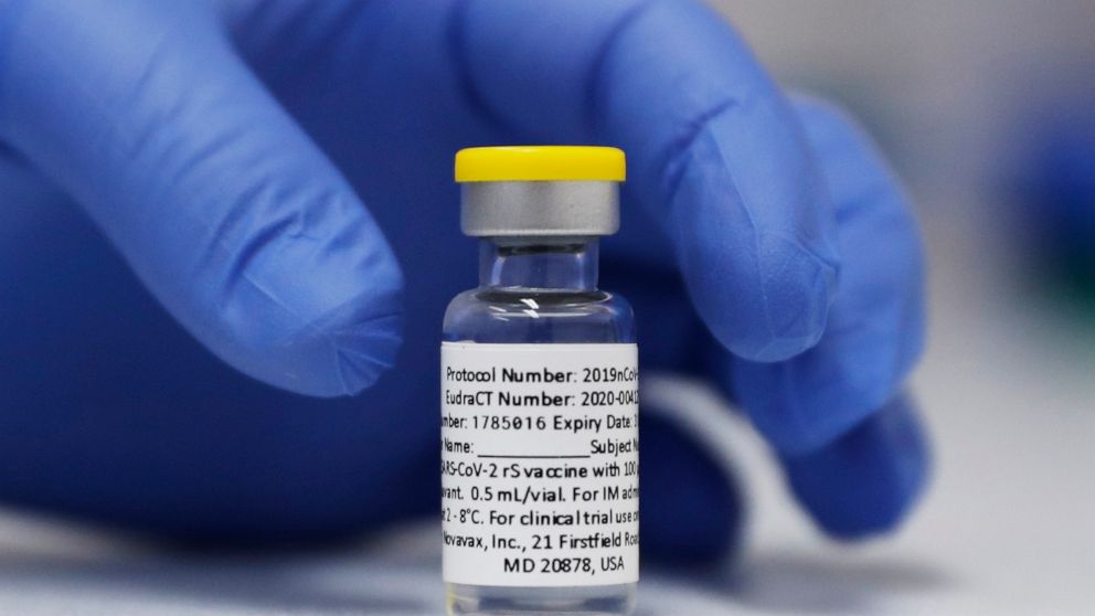 FILE - A vial of the Phase 3 Novavax coronavirus vaccine prepared for use in a trial at St. George's University hospital in London on Wednesday, Oct. 7, 2020. On Thursday, Feb. 10, 2022, Novavax announced that its protein-based COVID-19 vaccine prove
