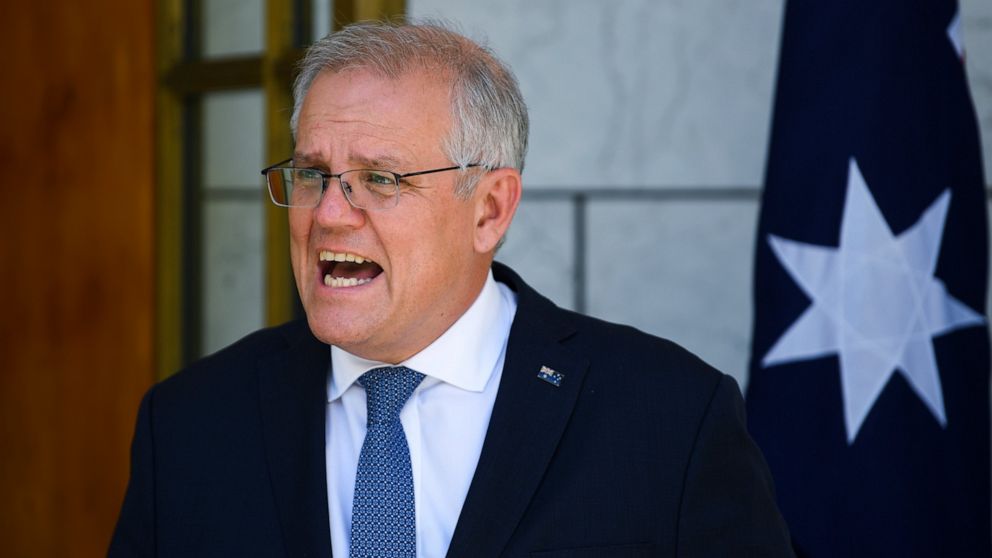 Australia PM meets with state leaders as virus cases surge