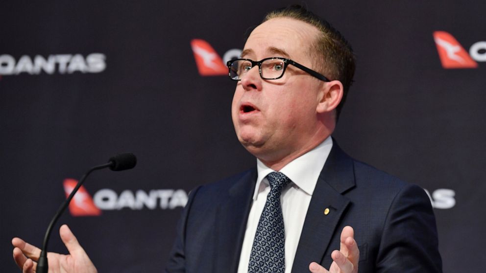 Qantas Chief Executive Officer Alan Joyce gestures during a results announcement in Sydney, Thursday, Aug. 20, 2020. Qantas Airways announced that the pandemic cost it 4 billion Australian dollars ($2.9 billion) in revenue in the last fiscal year and