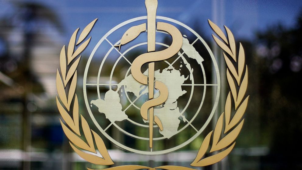 FILE - The logo of the World Health Organization is seen at the WHO headquarters in Geneva, Switzerland, June 11, 2009. The World Health Organization chief on Tuesday, Feb. 1, 2022 says 90 million cases of coronavirus have been reported since the omi
