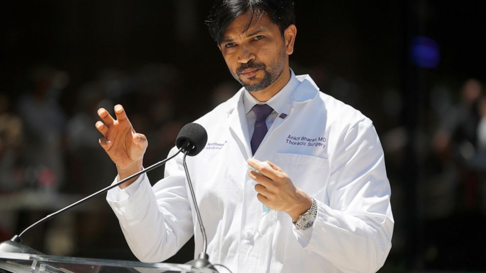 Dr. Ankit Bharat, chief of thoracic surgery at Northwestern Memorial Hospital, talks Thursday, June 11, 2020, in Chicago, about a double lung transplant he performed on a Chicago woman in her 20s who had major lung damage from the coronavirus. (AP Ph