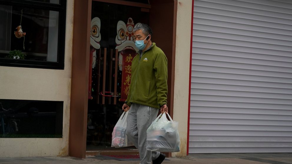 Panic-buying in Beijing as city adds new quarantine centers
