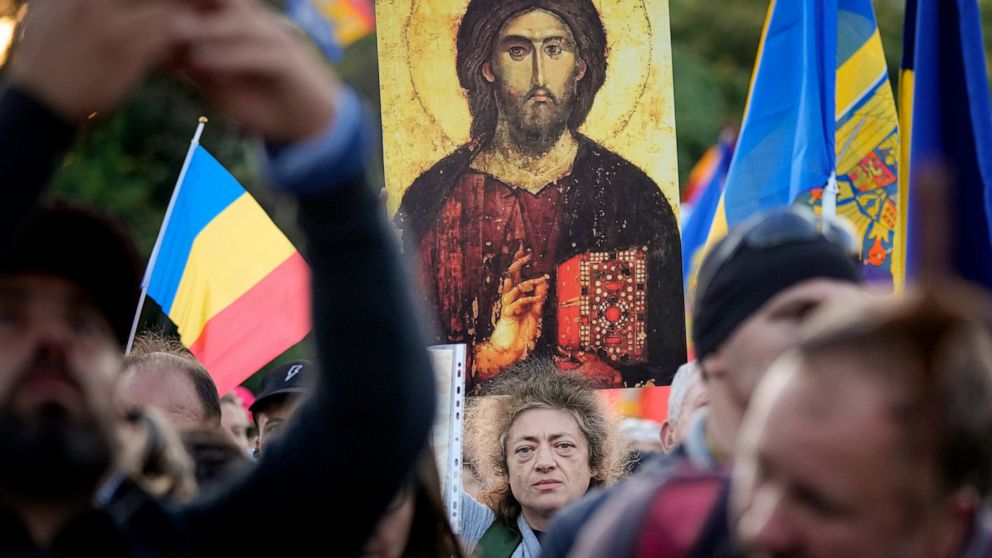 Protesters in Romania reject coronavirus restrictions