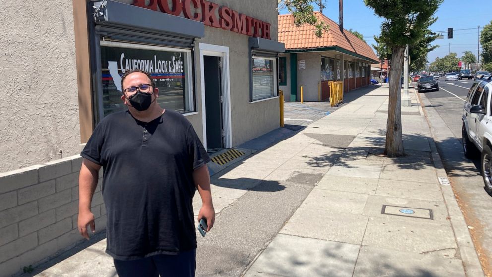 Nick Barragan wears a mask while running errands in Los Angeles on Wednesday, July 13, 2022. Los Angeles County is facing a return to a broad indoor mask requirement if current trends in hospital admissions continue, health officials said. Barragan s
