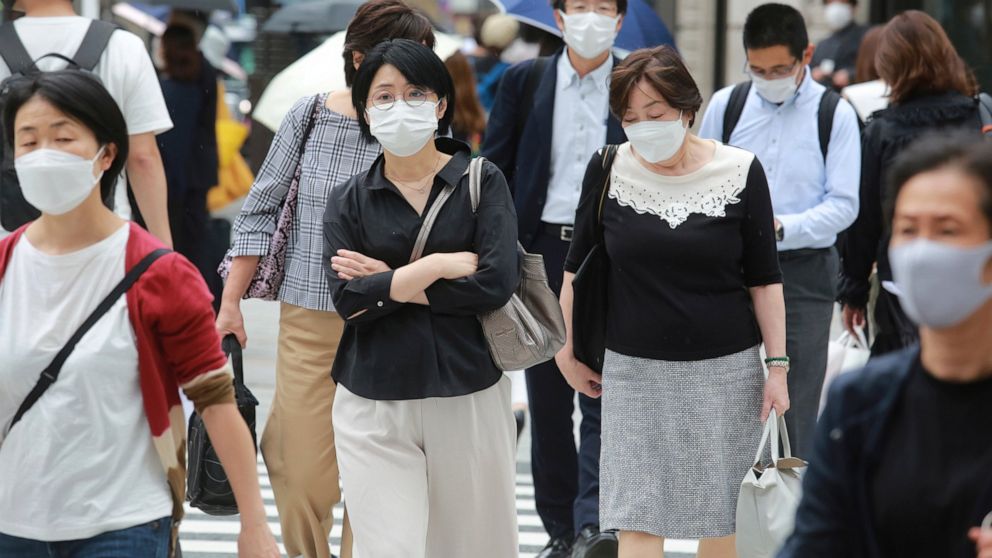 Japan extends virus emergency until end of September