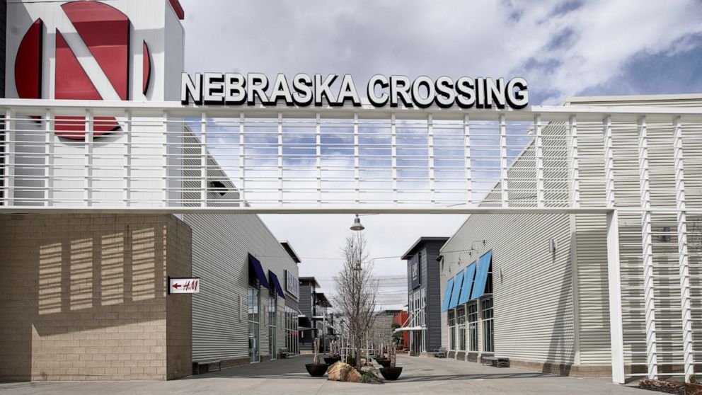 The Nebraska Crossing Outlet shopping mall is seen in Gretna, Neb., Tuesday, April 14, 2020. The outlet mall near Omaha plans to reopen later this month even as the number of coronavirus cases and deaths continues to grow in the state. The owner of t