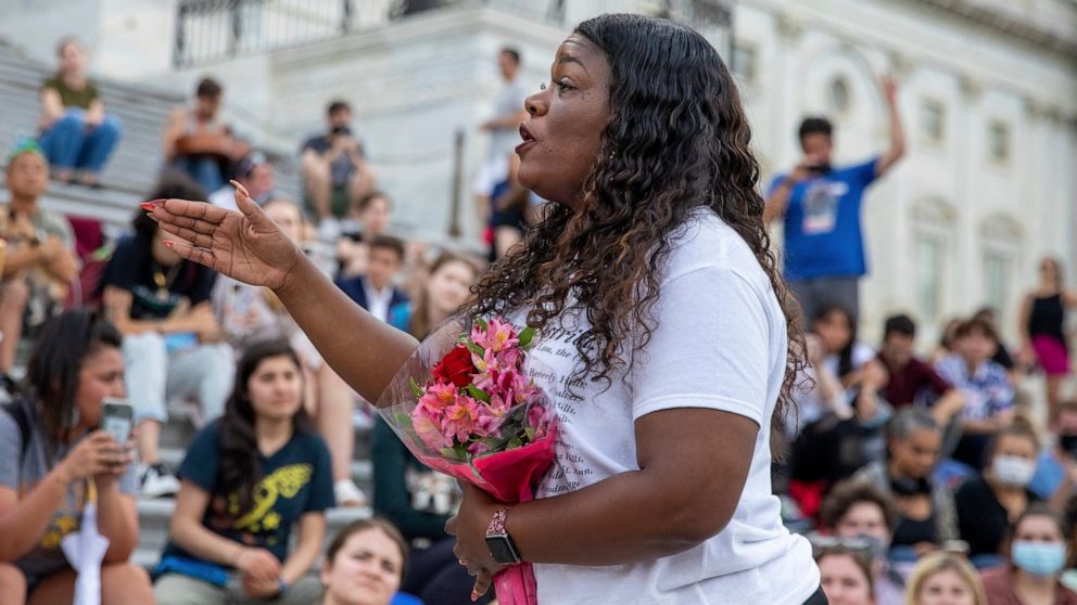 Rep. Cori Bush, D-Mo., speaks to crowds that attended a sit-in at Capitol Hill after it was announced that the Biden administration will enact a targeted nationwide eviction moratorium outside of Capitol Hill in Washington on Tuesday, August 3, 2021.
