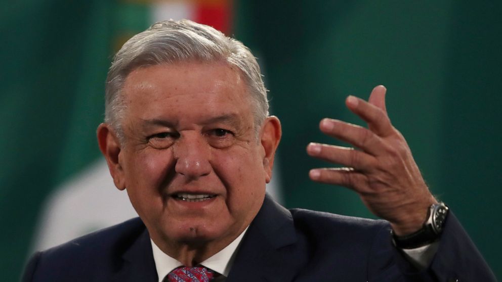 Mexican President Andrés Manuel López Obrador gives his daily morning press conference following a two-week absence after he tested positive for coronavirus, at the presidential palace, Palacio Nacional, in Mexico City, Monday, Feb. 8, 2021. (AP Phot