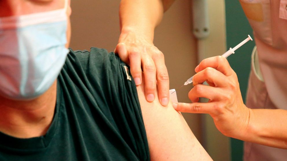 The Latest: EU vaccination campaign catching up with US