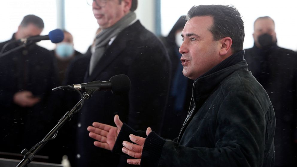 North Macedonia's Prime Minister Zoran Zaev, right, talks for the media on a news conference with Serbia's President Aleksandar Vucic, left, during a handover of COVID-19 vaccines, at the border crossing Tabanovce, between North Macedonia and Serbia,