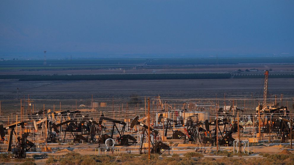 FILE - This May 1, 2018 file photo shows oil pump jacks in an oil field near Taft, Calif. California's oil rich Kern County is voting on a revised plan that could permit tens of thousands of oil and gas wells in the next two decades. The plan had to 