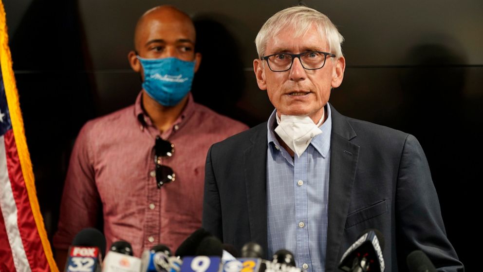 FILE - In this Aug. 27, 2020, file photo, Wisconsin Gov. Tony Evers speaks during a news conference in Kenosha, Wis. Wisconsin health officials and Gov. Evers announced Wednesday, Oct. 7, 2020, that they've opened a field hospital at the state fairgr