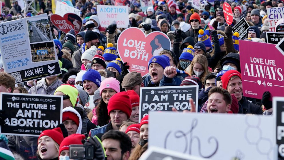 People attend the March for Life rally on the National Mall in Washington, Friday, Jan. 21, 2022. The March for Life, for decades an annual protest against abortion, arrives this year as the Supreme Court has indicated it will allow states to impose 