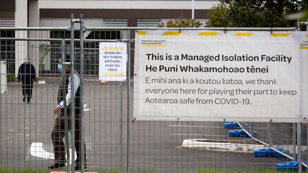 People exercise at a government managed isolation and quarantine (MIQ) facility in Auckland, New Zealand on Sept. 30, 2021. New Zealand will reopen its borders to the world over the coming months, the government announced Wednesday, Nov. 24, 2021, al