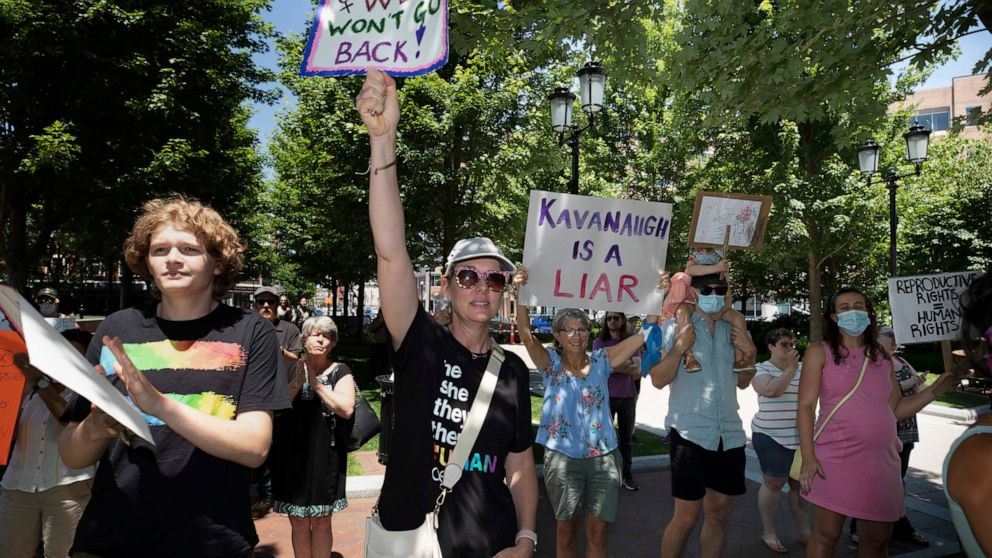 Abortion-rights supporters rally, Saturday, June 25, 2022, in Quincy, Mass., a day after the Supreme Court ended constitutional protections for abortion that had been in place nearly 50 years in a decision by its conservative majority to overturn Roe
