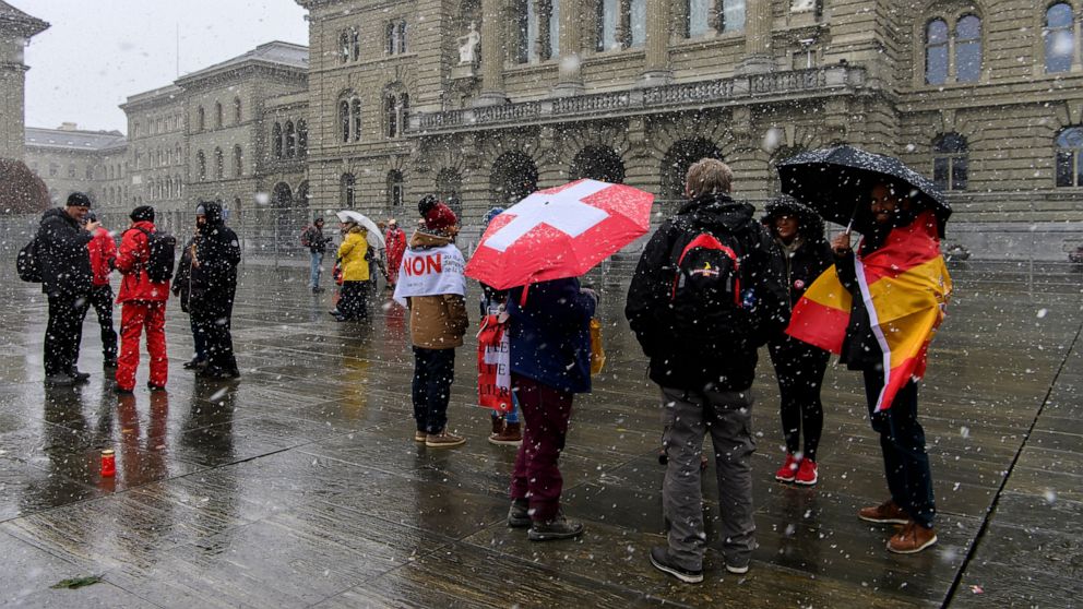 Swiss vote to approve COVID restrictions as infections rise