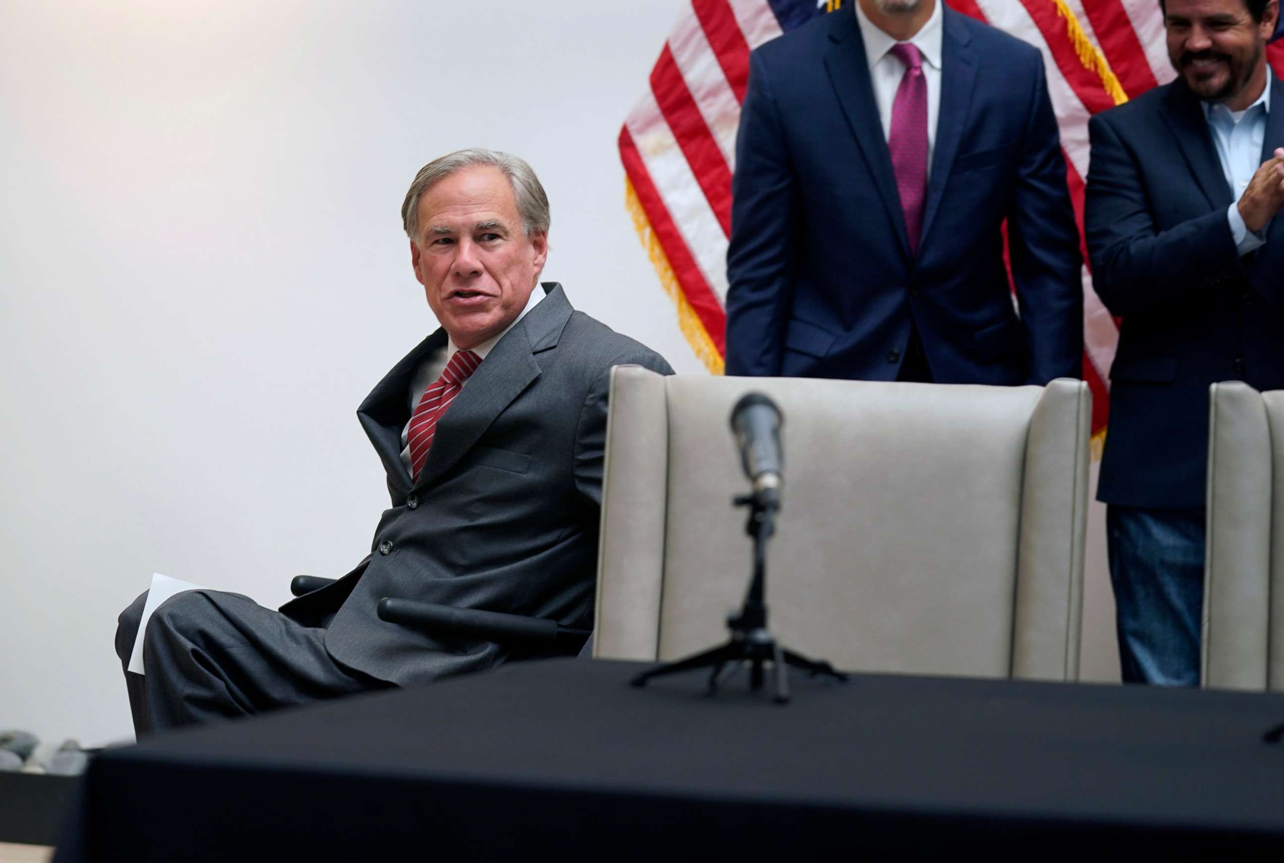PHOTO: Texas Gov Greg Abbott arrives to sign Senate Bill 1, also known as the election integrity bill, into law in Tyler, Texas, Sept. 7, 2021.