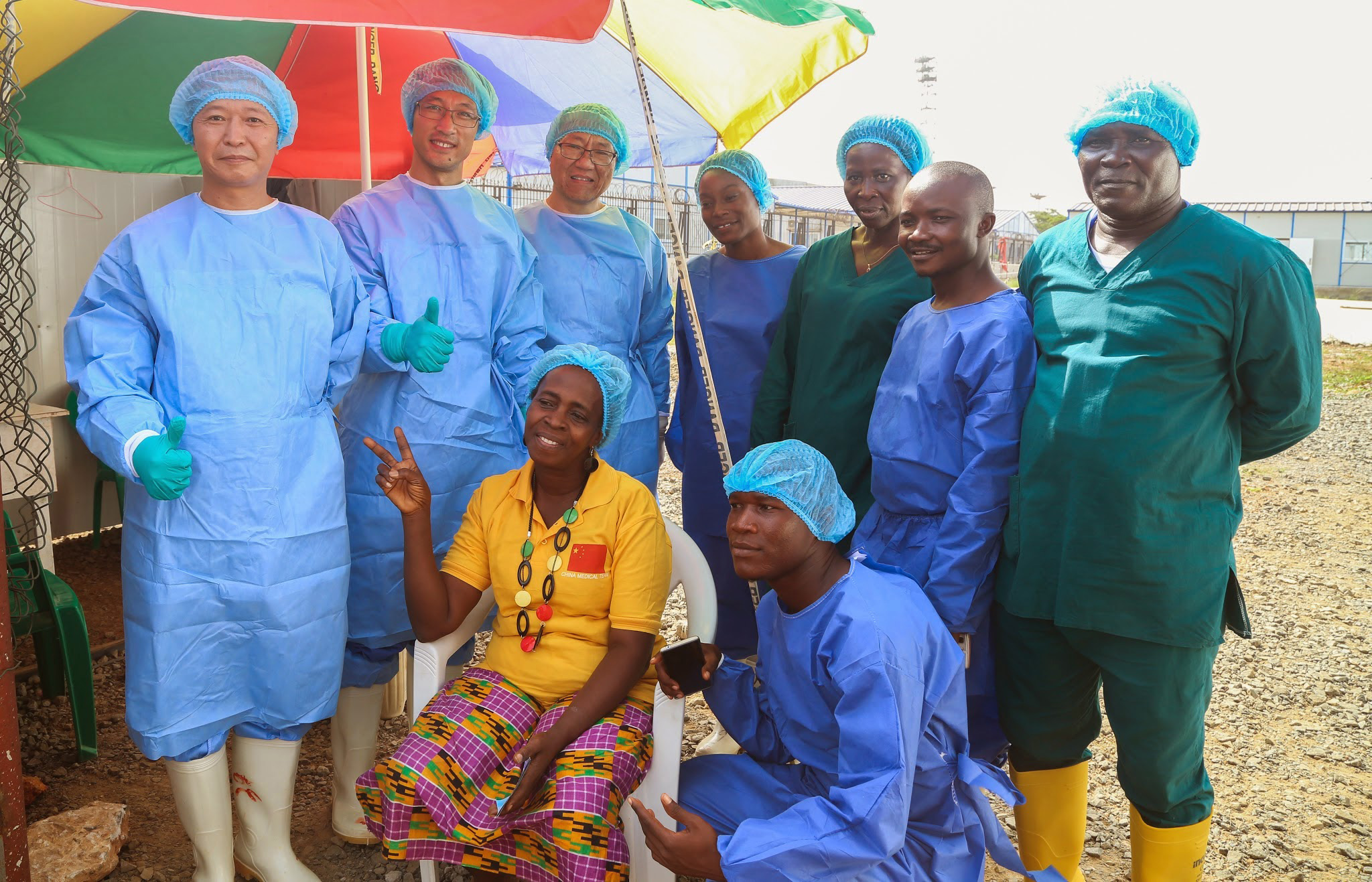 PHOTO: Beatrice Yardolo poses for a photo with members of the Ebola treatment unit on the day of her release in Monrovia, Liberia on March 5, 2015.