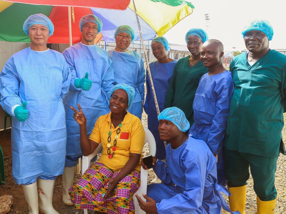 PHOTO: Beatrice Yardolo poses for a photo with members of the Ebola treatment unit on the day of her release in Monrovia, Liberia on March 5, 2015.