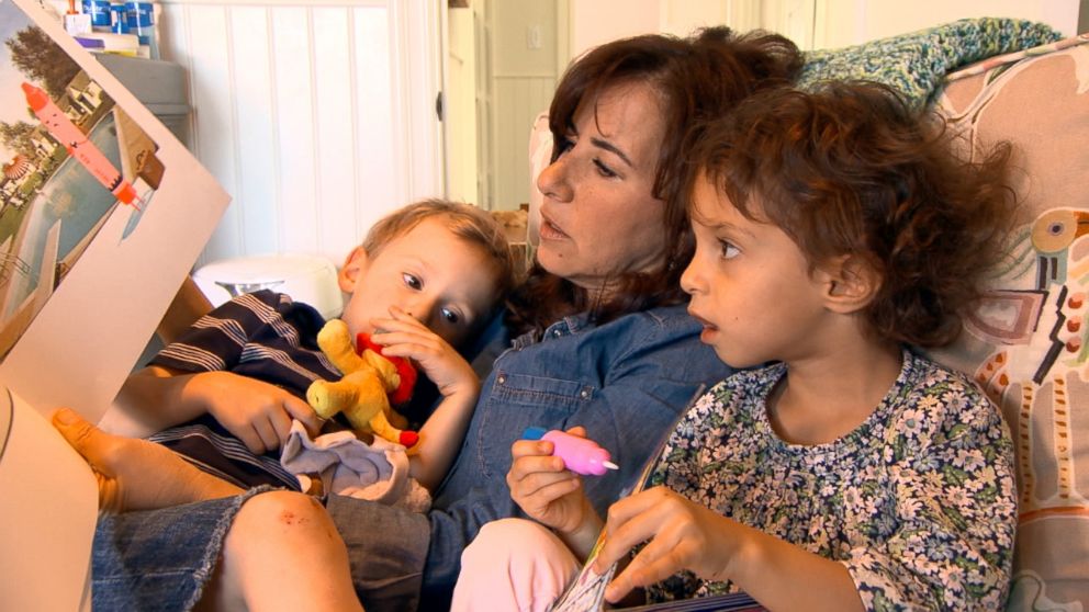 Michelle Bader is shown here with the twins she gave birth to through the help of egg donation. 