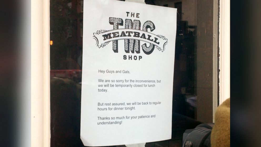 PHOTO: A sign on the front door of The Meatball Shop on Greenwich Avenue in the Manhattan borough of New York City says that the shop is closed for lunch but will reopen for dinner on Oct. 24, 2014.