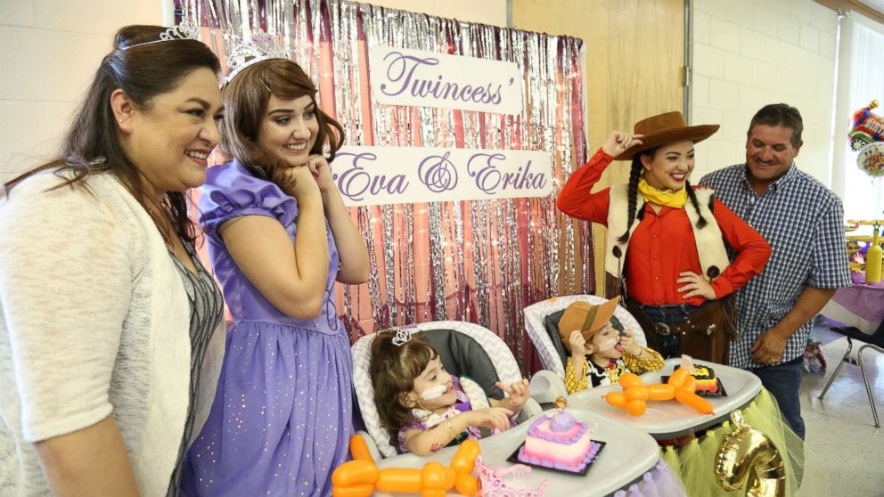 Formerly conjoined twins Eva and Erika Sandoval are seen here celebrating their third birthday.