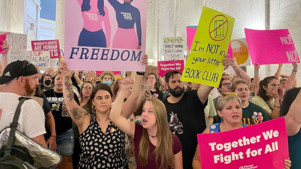 PHOTO:  Abortion rights advocates chant outside of the West Virginia Senate chambers prior to a vote on an abortion bill, July 29, 2022, in Charleston, W.Va.
