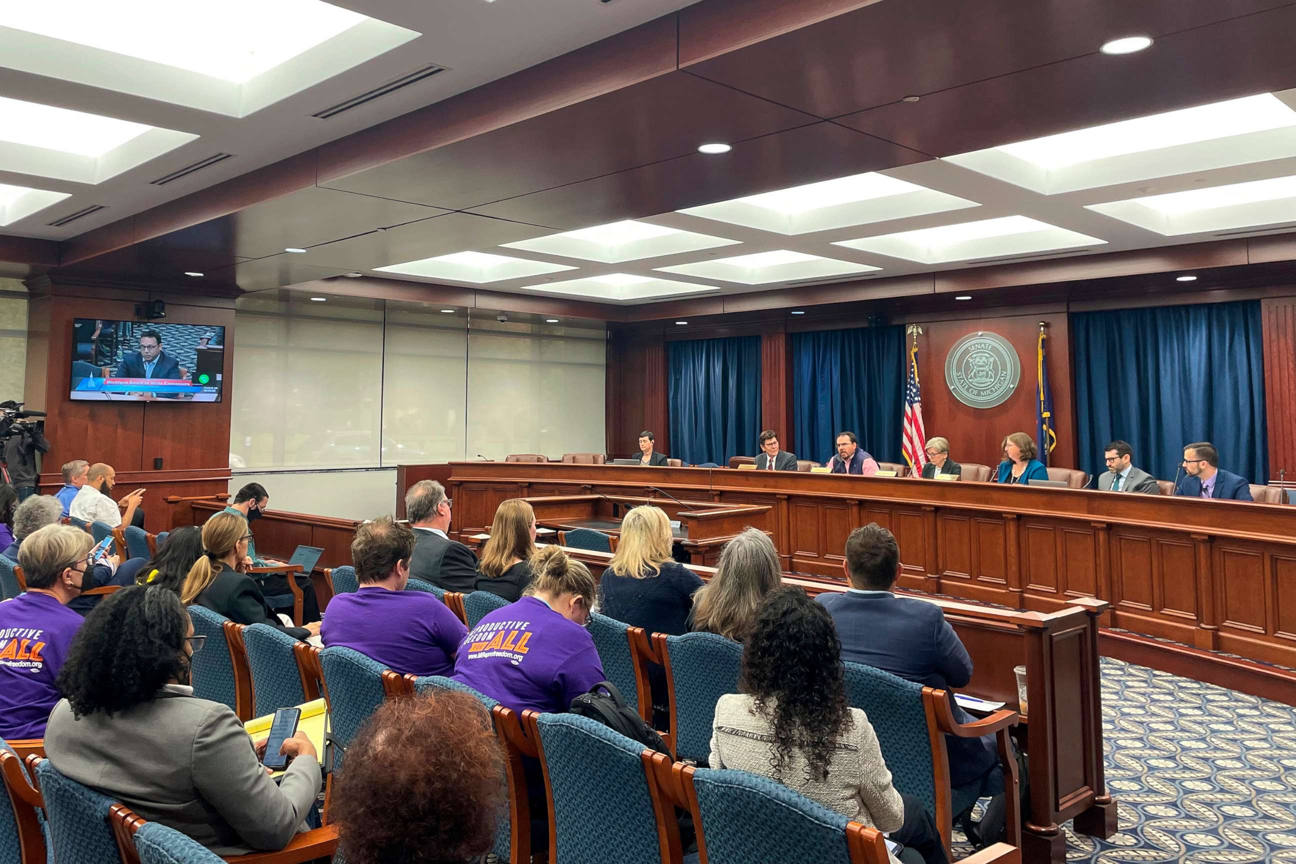 PHOTO: Reproductive Freedom for All leaders and supporters await the Michigan Board of Canvassers vote to send their initiative to the November ballot during a Friday, Sept. 9, 2022, meeting in Lansing, Mich.