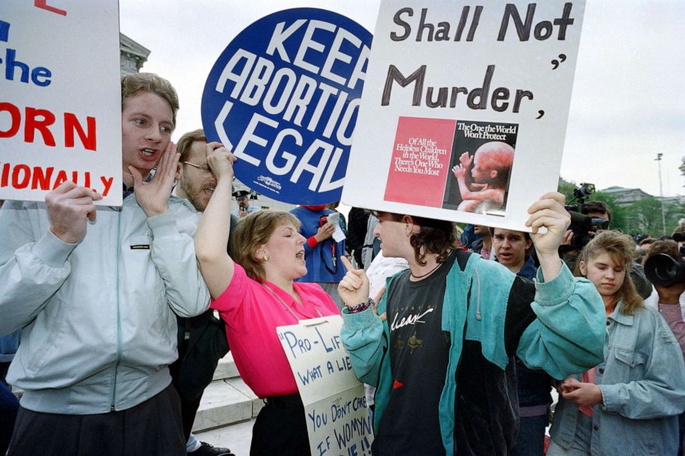 PHOTO: Abortion and anti-abortion activists face off on the steps of the Supreme Court building on April 26, 1989 in Washington, as the court prepares to hear arguements reopening the 1973 landmark abortion case "Roe vs Wade."