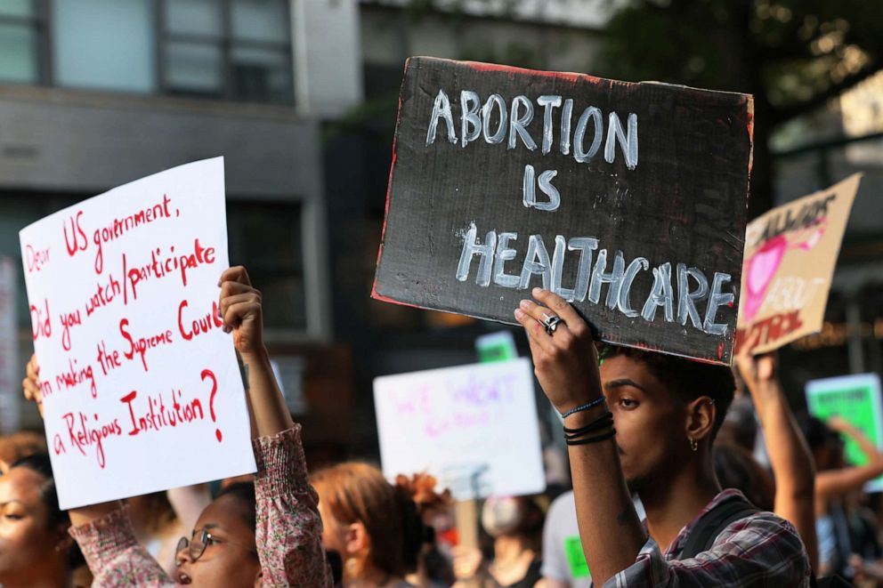 PHOTO: People march as they protest the Supreme Courts 6-3 decision in the Dobbs v. Jackson Women's Health Organization, June 24, 2022 in New York City. 