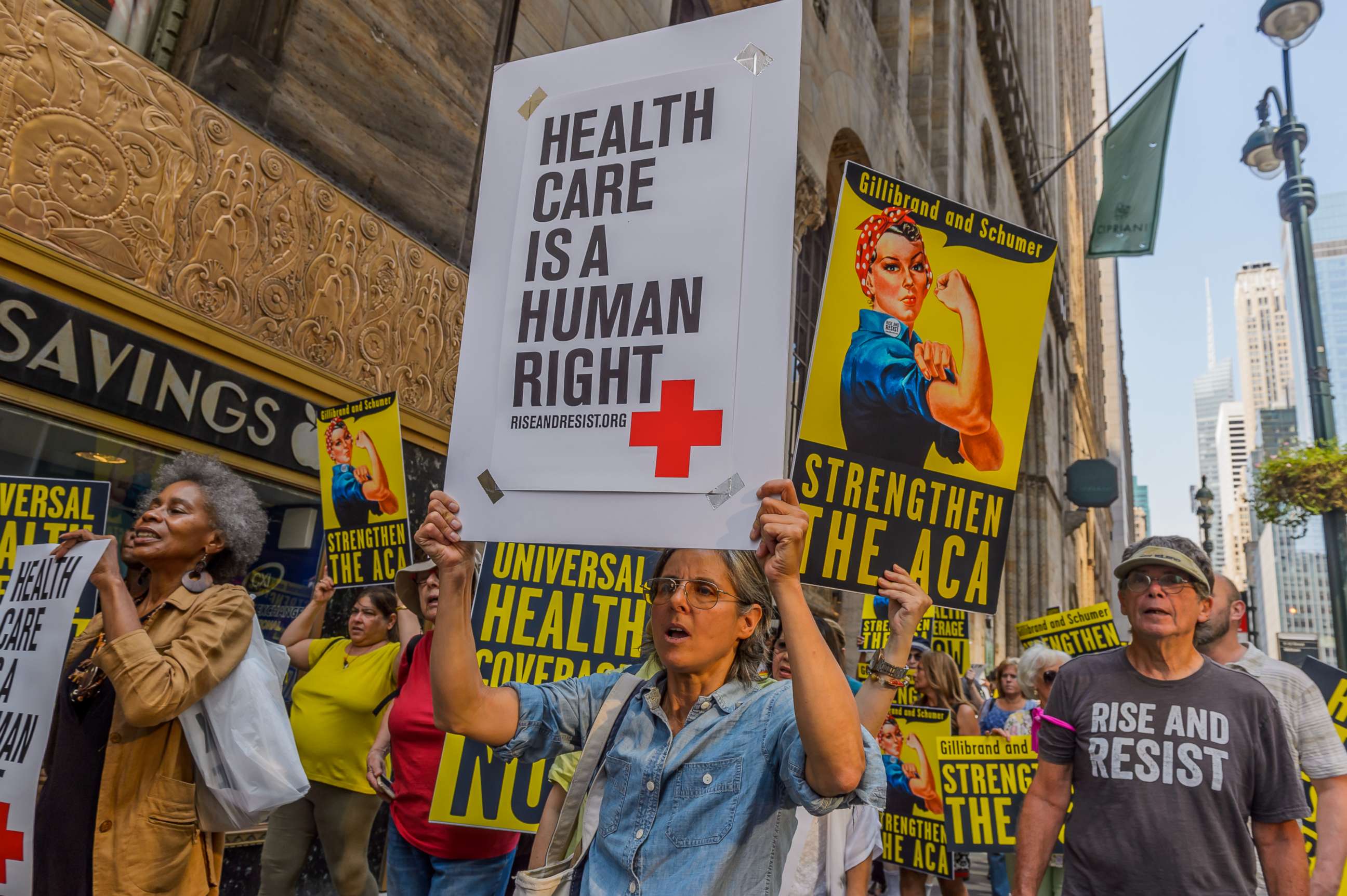 PHOTO: Activists marched to the offices of Senators Schumer and Gillibrand in New York, Sept. 5, 2017, carrying a giant lunchbox filled with messages from constituents that urged them to get "Save Our Healthcare.