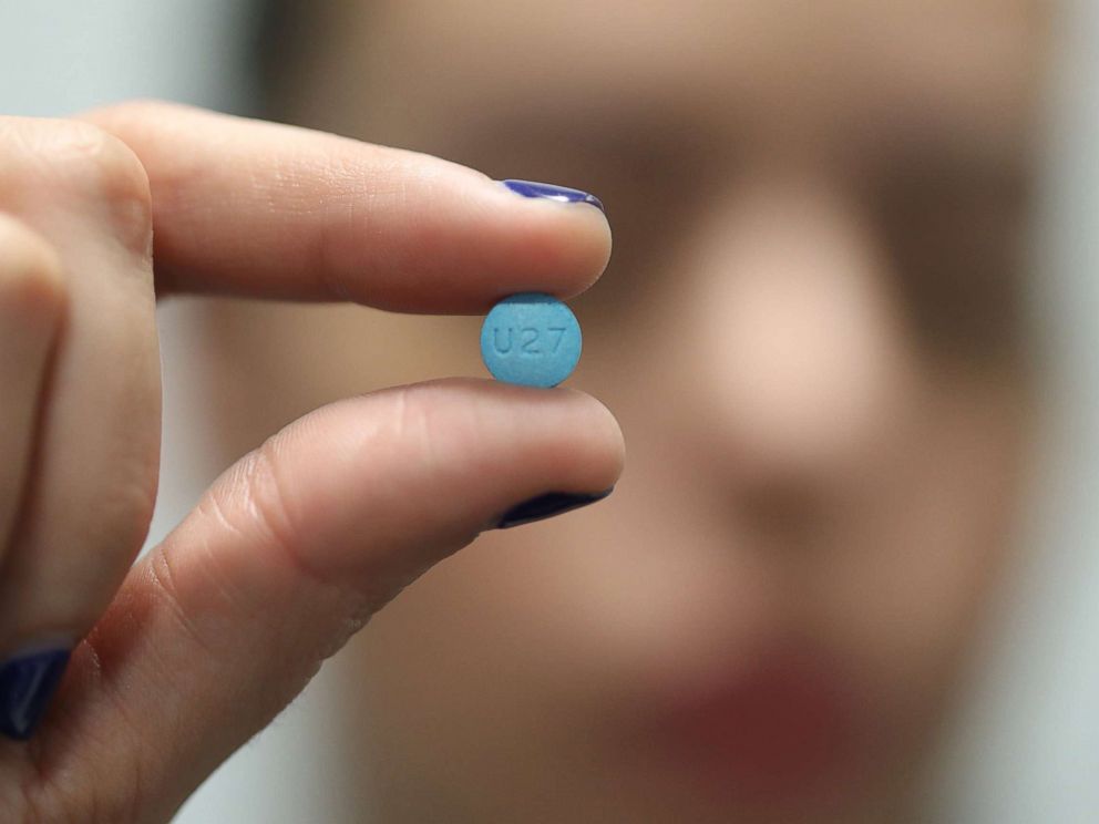 PHOTO: A person holds an Adderall pill in Puerto Rico, July 5, 2017.
