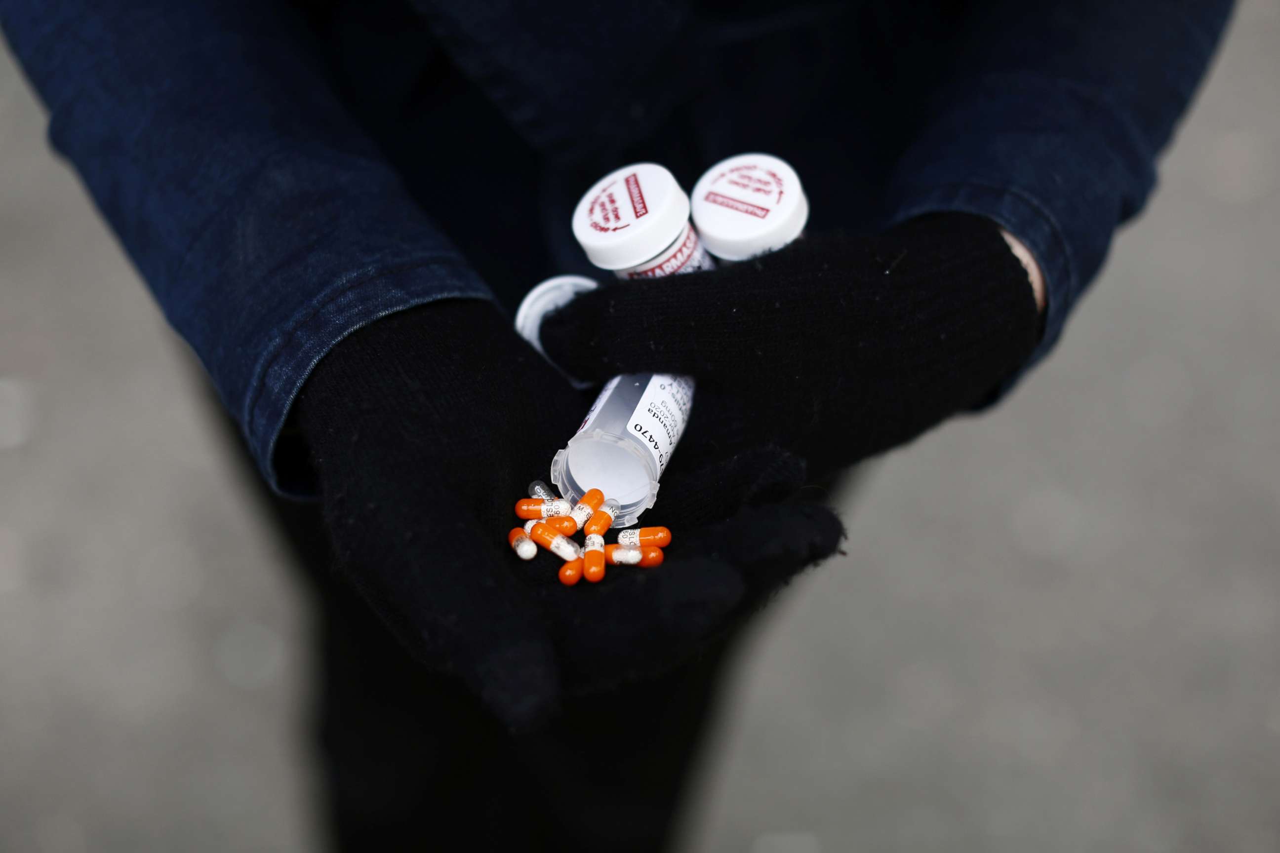 PHOTO: A fentanyl user displays a "safe supply" of opioid alternatives provided by the local health unit to combat overdoses due to poisonous additives and to support addicts during the coronavirus pandemic, April 6, 2020, in Vancouver, Canada.