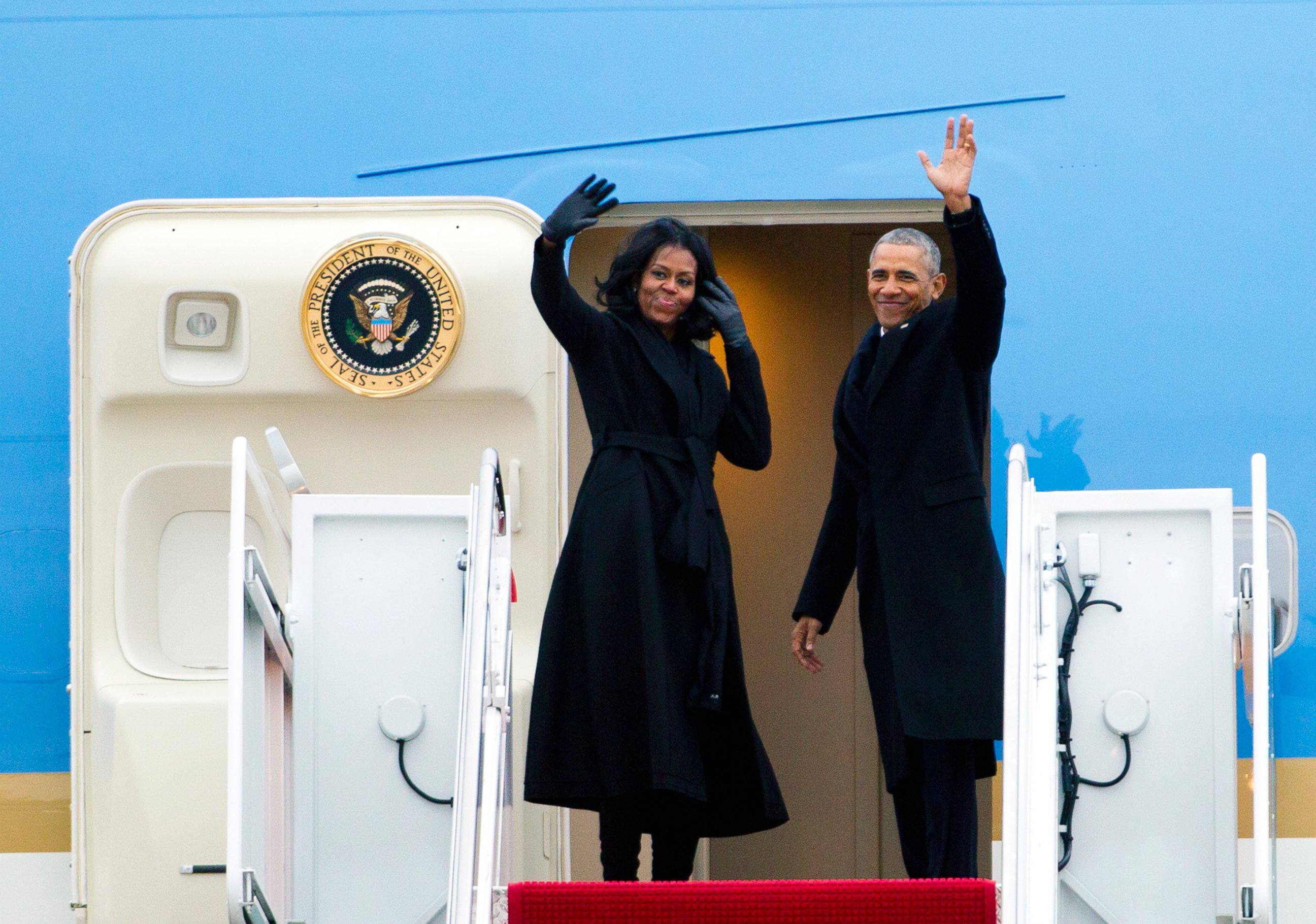 PHOTO: President Barack Obama and first lady Michelle Obama wave from Air Force One at Andrews Air Force Base, Maryland, Jan. 10, 2017. Obama is traveling to Chicago to give his presidential farewell address.