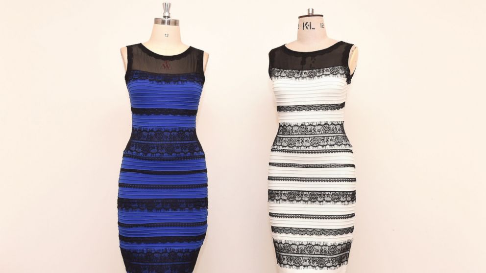 PHOTO: The two-tone dress, left,  alongside an ivory and black version, made by Roman Originals, that has sparked a global debate on Twitter over what color it is on display in Birmingham, England on Feb. 27, 2015.