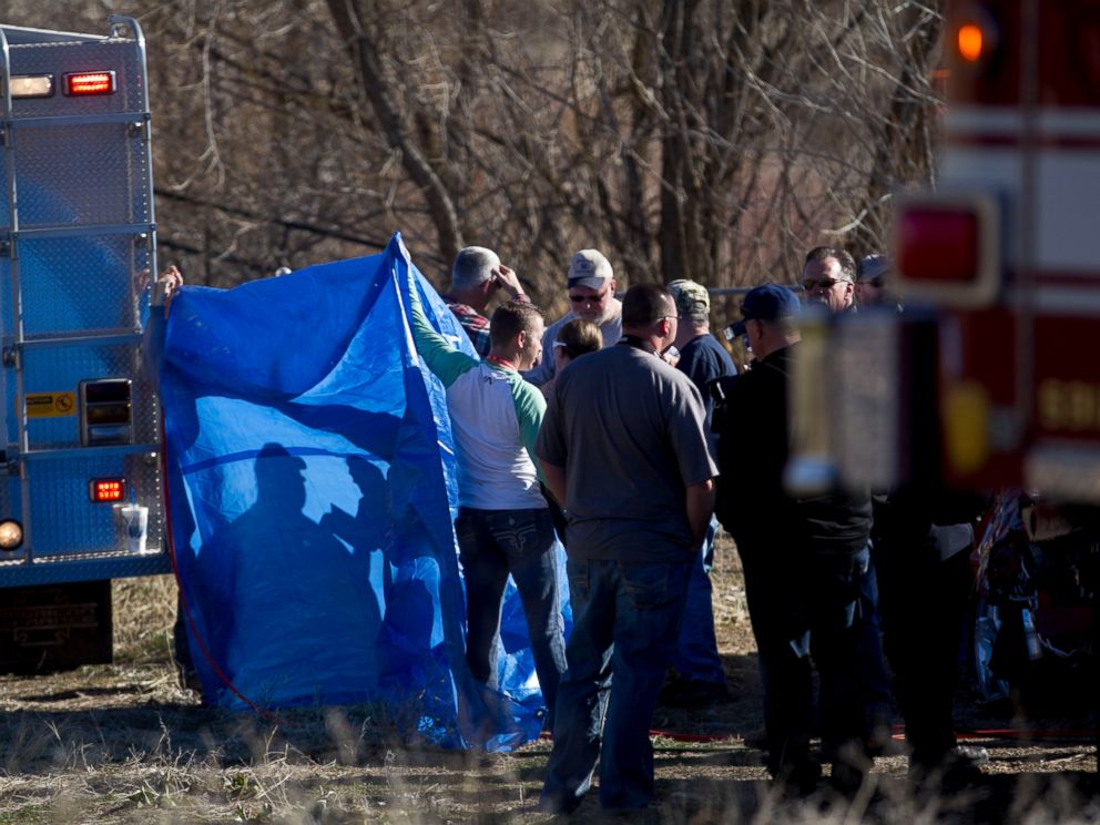 PHOTO: In this March 7, 2015 photo, officials respond to a report of car in the Spanish Fork River in Spanish Fork, Utah.