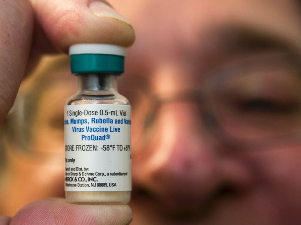 PHOTO: A pediatrician holds a dose of the measles-mumps-rubella (MMR) vaccine at his practice, Jan. 29, 2015, in Northridge, Calif.