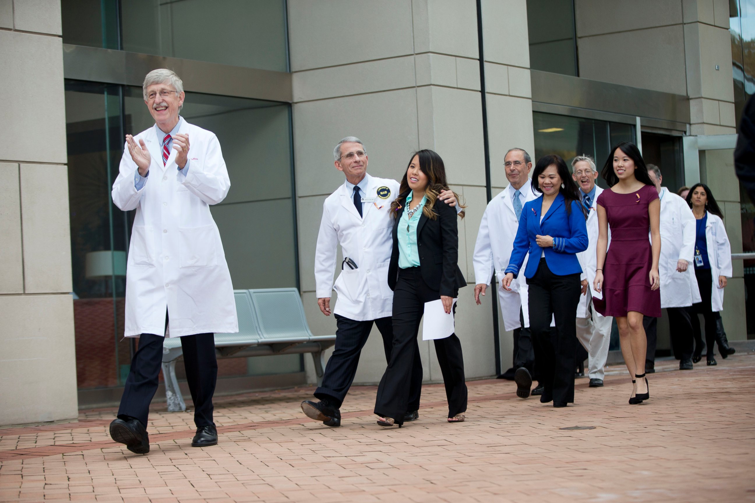 PHOTO: Patient Nina Pham is escorted outside of National Institutes of Health in Bethesda, Md., Oct. 24, 2014.