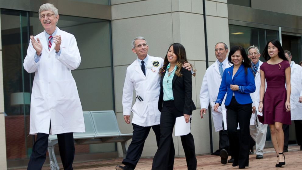 PHOTO: Patient Nina Pham is escorted outside of National Institutes of Health in Bethesda, Md., Oct. 24, 2014.