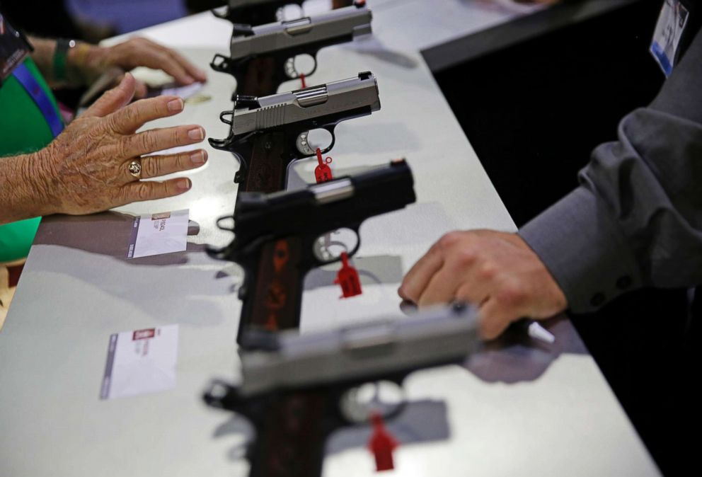 PHOTO: Guns sit on display at the NRA annual convention where President Donald Trump is scheduled to speak later in the day in Atlanta, Friday, April 28, 2017.