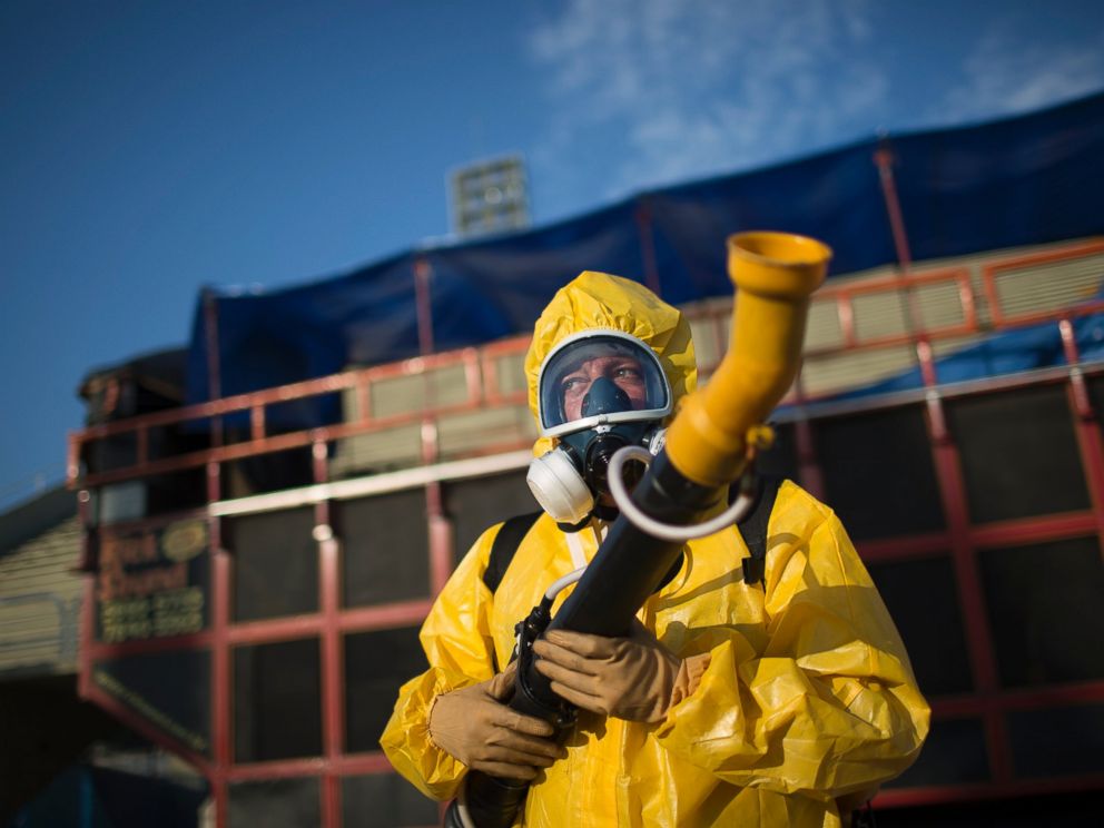 PHOTO: A health worker stands in the Sambadrome as he sprays insecticide to combat the Aedes aegypti mosquitoes that transmit the Zika virus, in Rio de Janeiro, Brazil, Jan. 26, 2016.