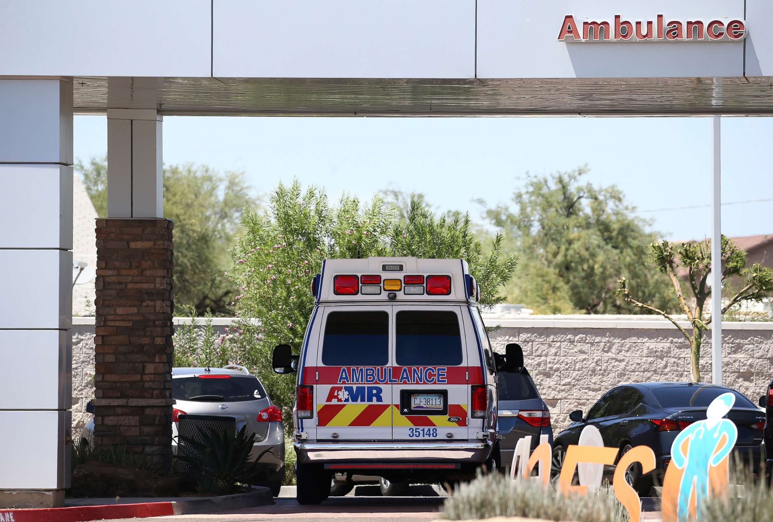 PHOTO: An ambulance is parked at Arizona General Hospital on June 10, 2020, in Laveen, Ariz.