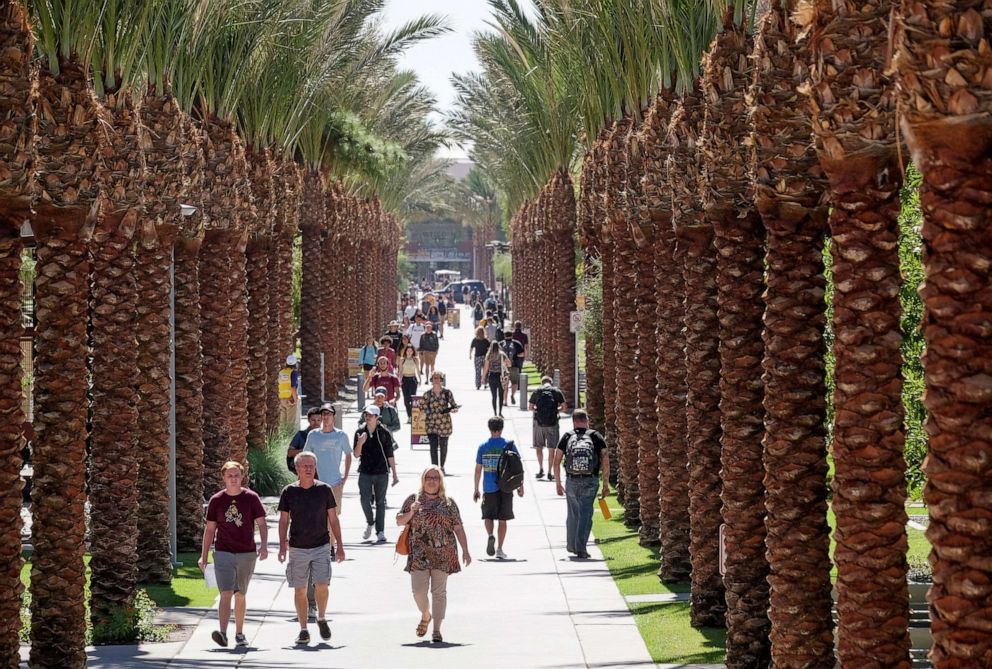 PHOTO: Palm trees line a pedestrian path at Arizona State University in Tempe, AZ, Oct. 6, 2017.