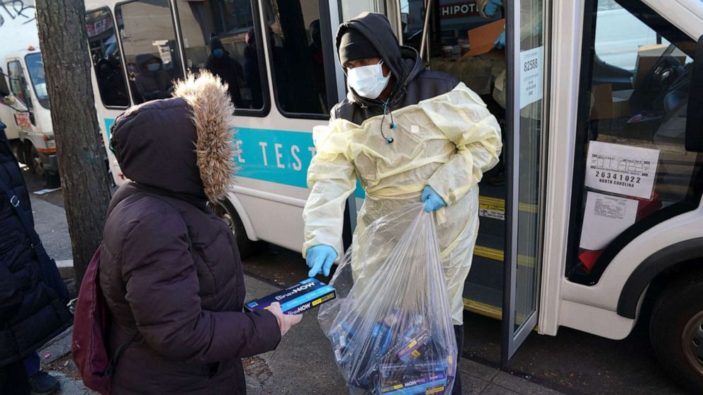 PHOTO: Binax Covid-19 testing kits are handed out in New York, on Dec. 23, 2021.