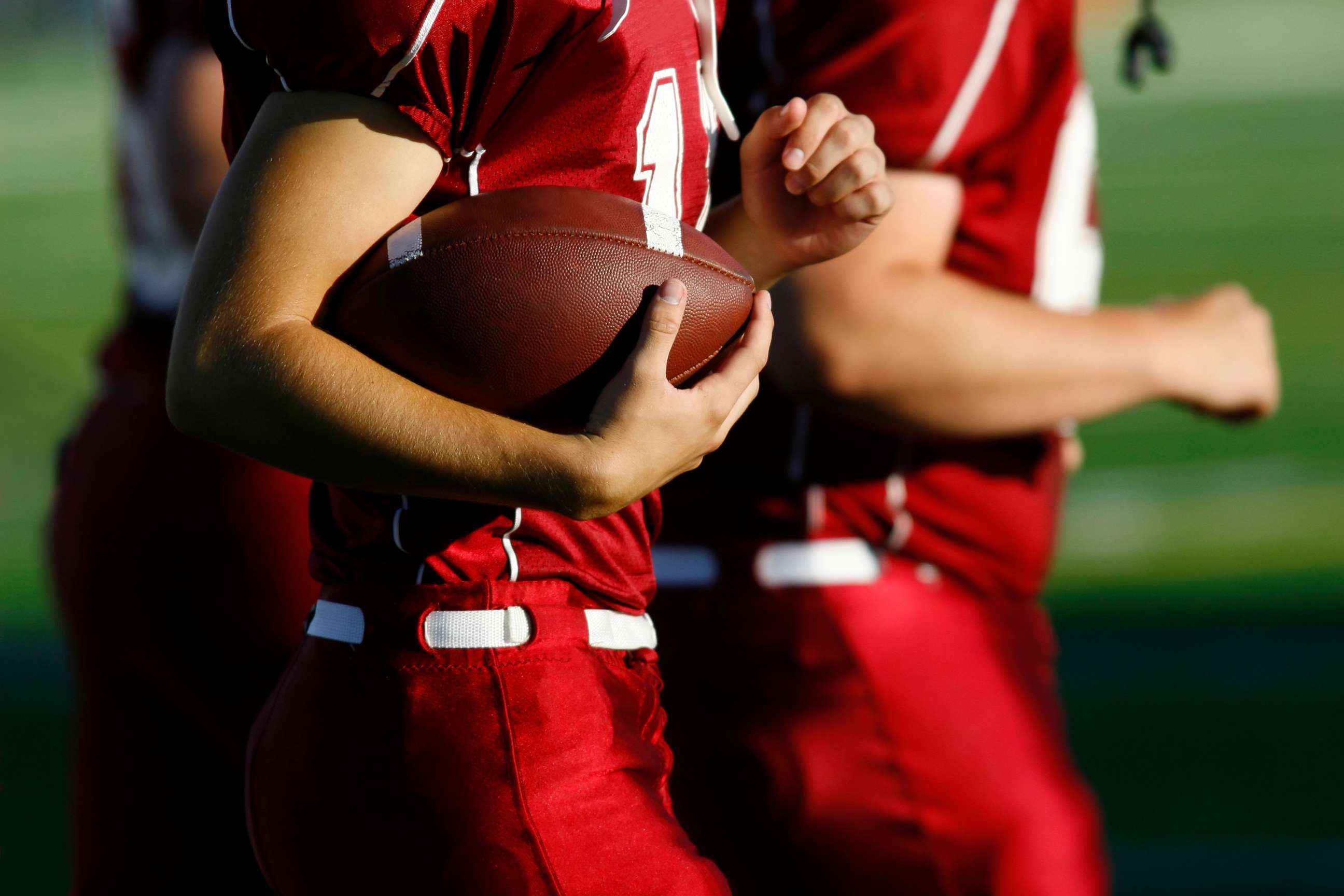 PHOTO: college athletes football.