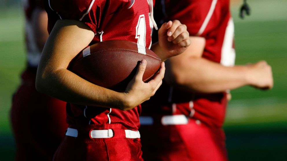 PHOTO: college athletes football.