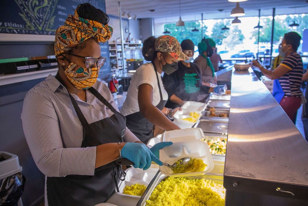 PHOTO: Volunteers at Springreens Community Cafe prepare free Iftar meals for fasting Muslims celebrating the holy month of Ramadan, in Atlanta, May 19, 2020.