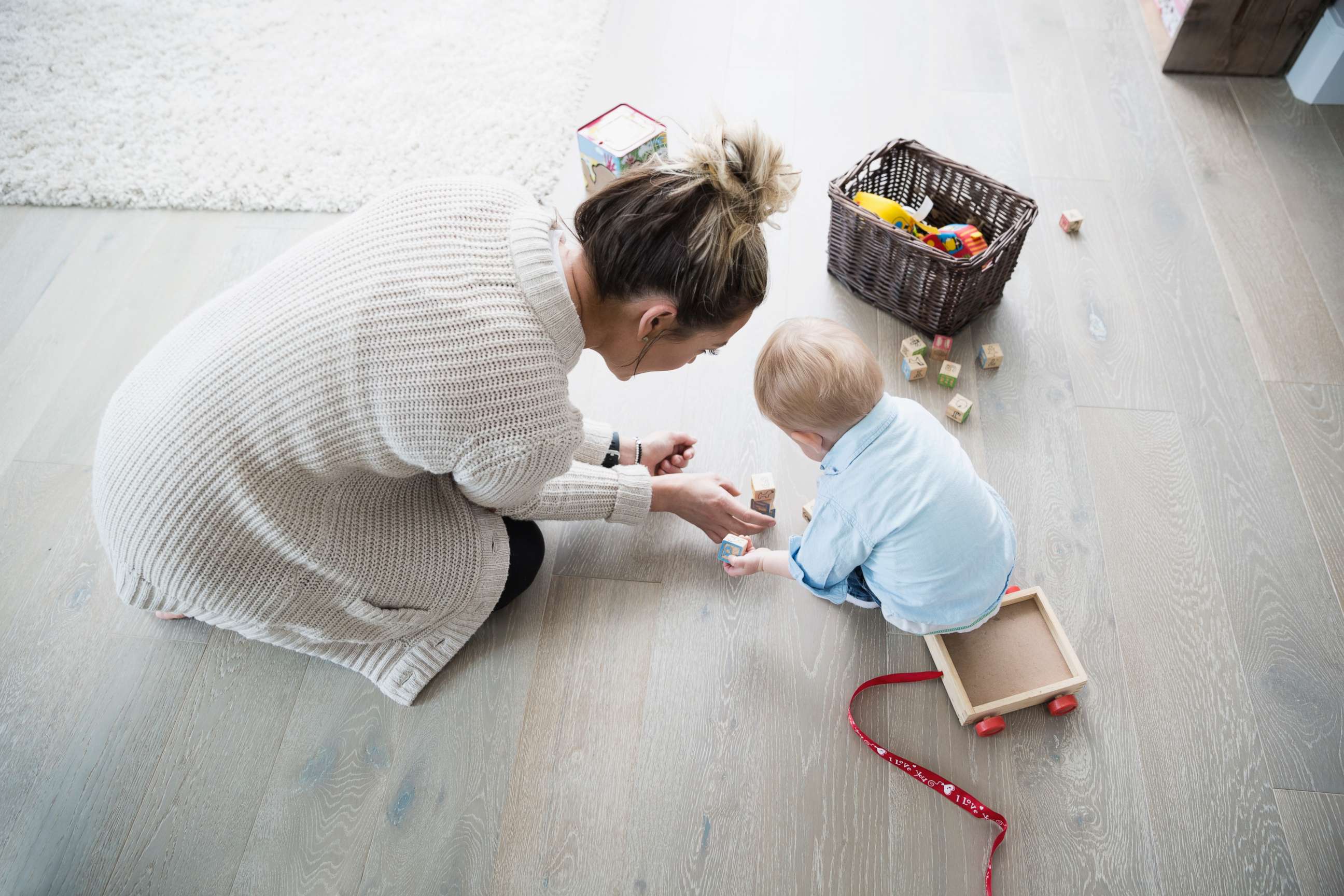 PHOTO: Mother and baby son playing with wood blocks in an undated stock photo. 