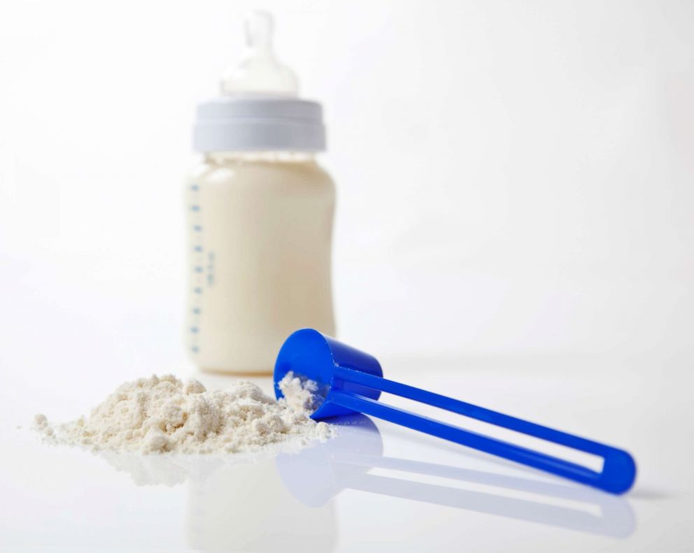 PHOTO: Baby milk formula is pictured with a plastic spoon and bottle in an undated stock photo.